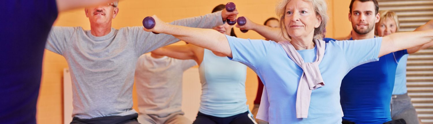 Older people in a group exercise class