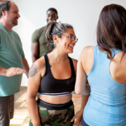 exercise class with group of men and women diverse ethnicities