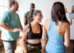 exercise class with group of men and women diverse ethnicities