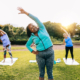 Senior sport people exercising during yoga workout class outdoor at park city - Fitness joyful Elderly lifestyle