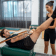 Reformer Pilates machine in use
