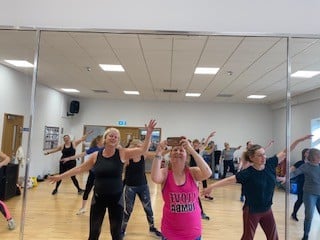 Group exercise class taking place.