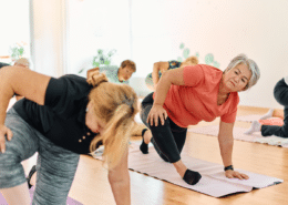 Senior women practicing yoga