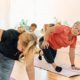 Senior women practicing yoga